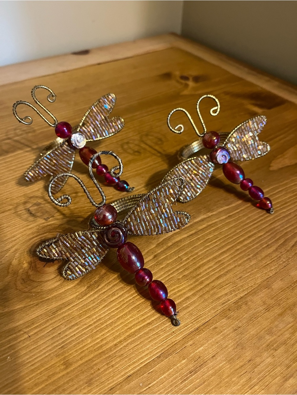 3 Pier one dragonfly napkin holders with glass red beads 3 1/2 x 3 1/2”
